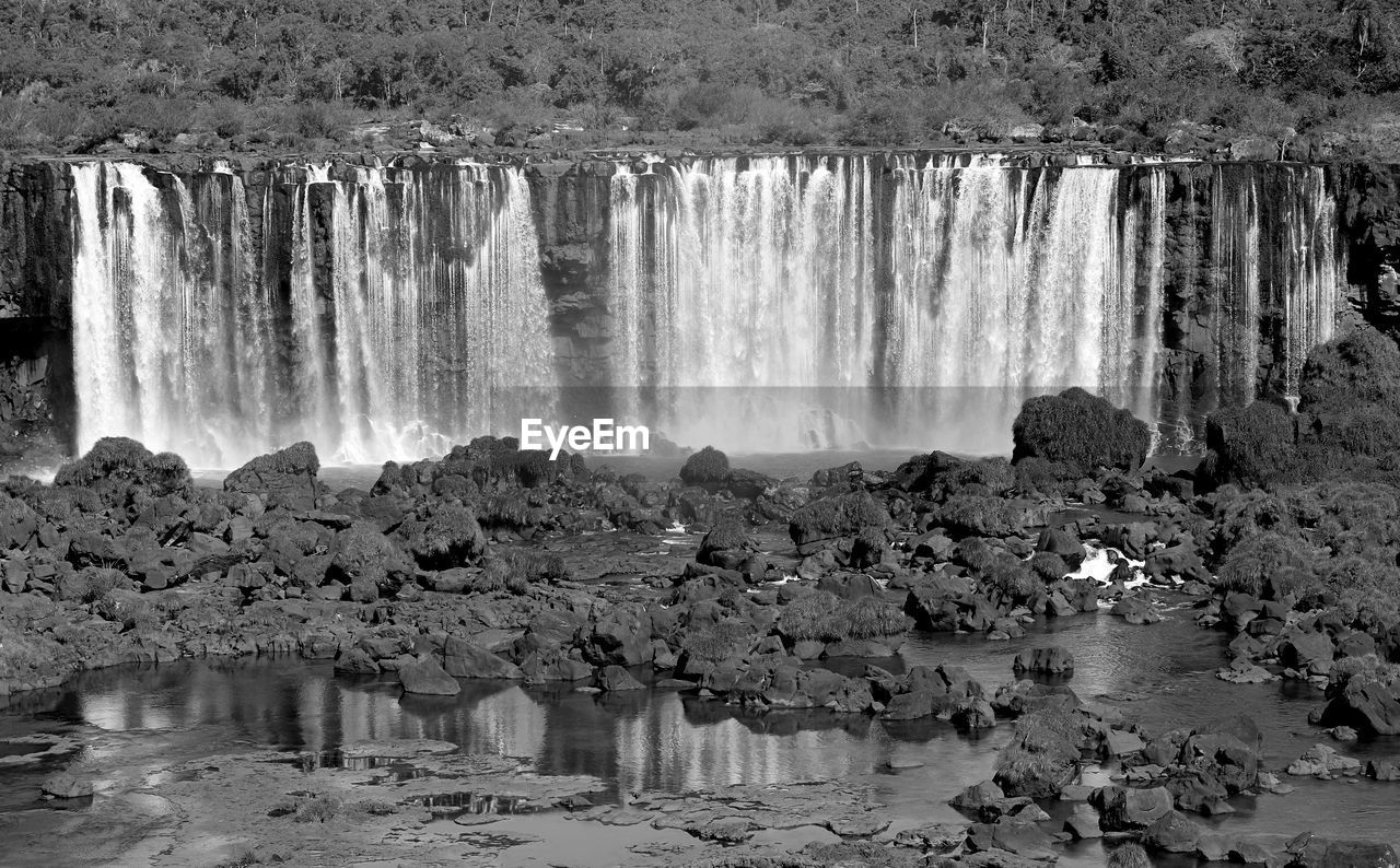 Panoramic view of iguazu falls at the brazilian side, foz do iguacu, brazil in monochrome