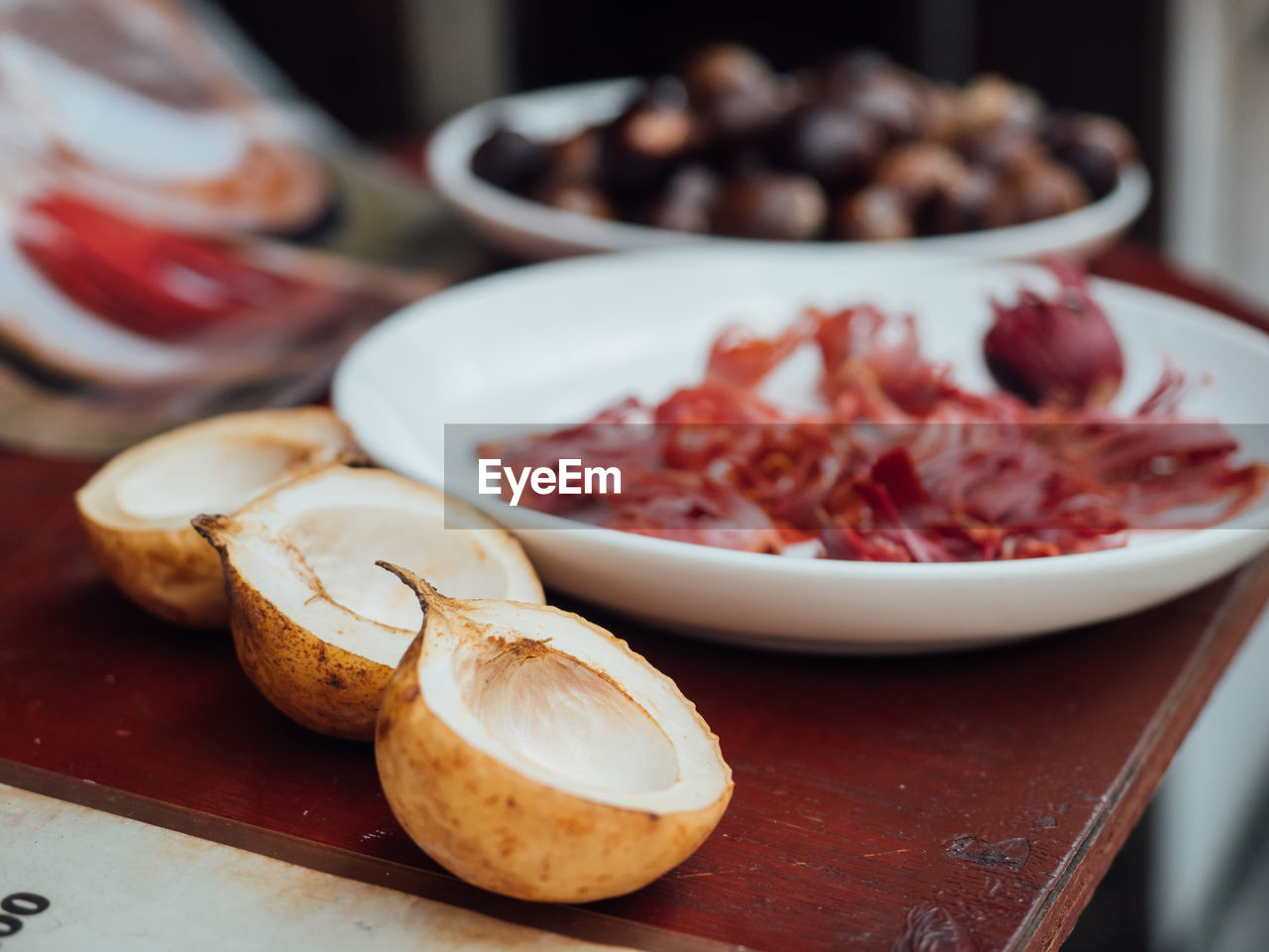 CLOSE-UP OF FRUITS ON TABLE