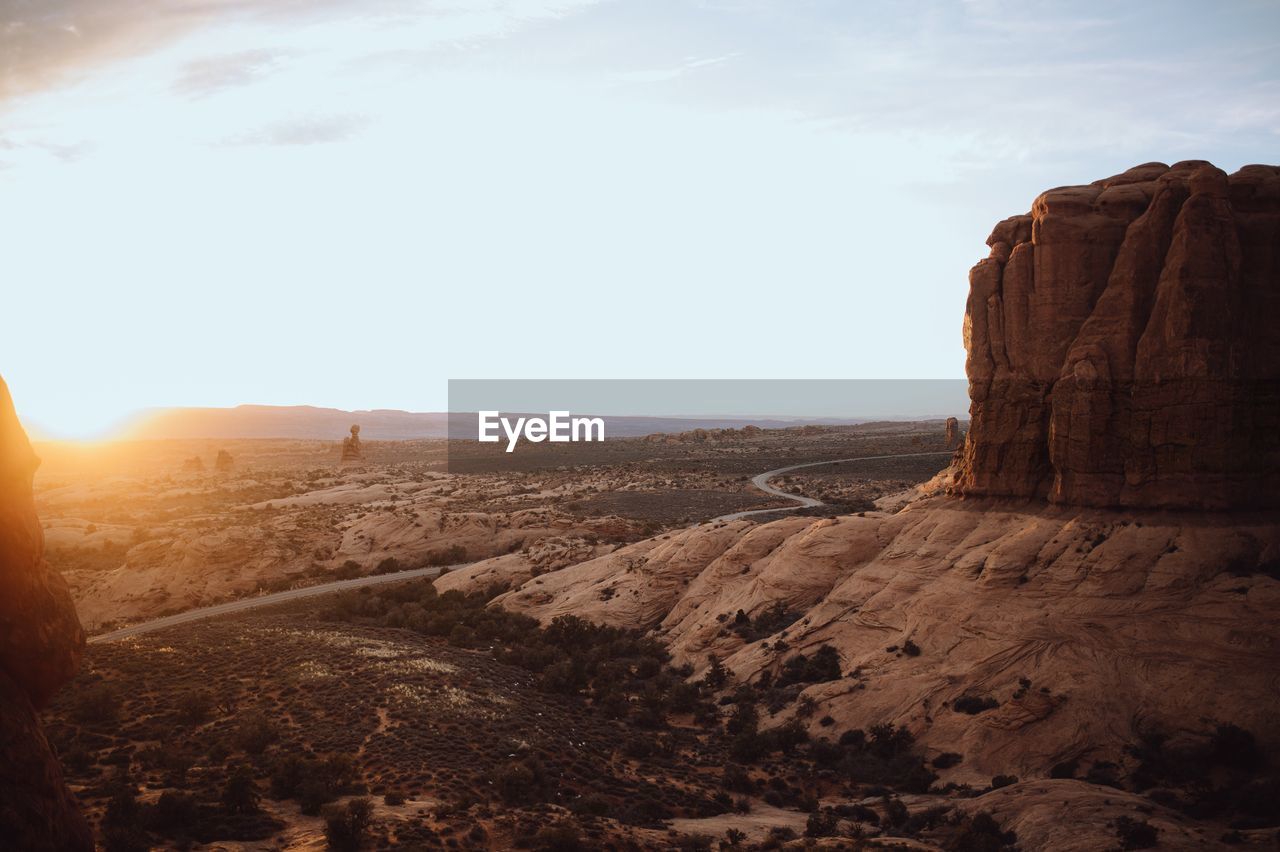 Scenic view of rock formations against sky