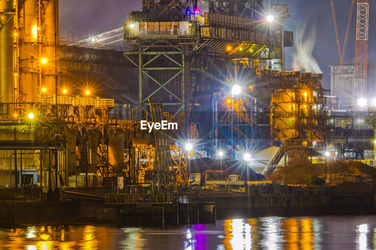 night, water, illuminated, industry, reflection, cityscape, power generation, architecture, transportation, business, nautical vessel, evening, harbor, no people, nature, built structure, oil industry, outdoors, factory, sky, business finance and industry, freight transportation, pier, vehicle