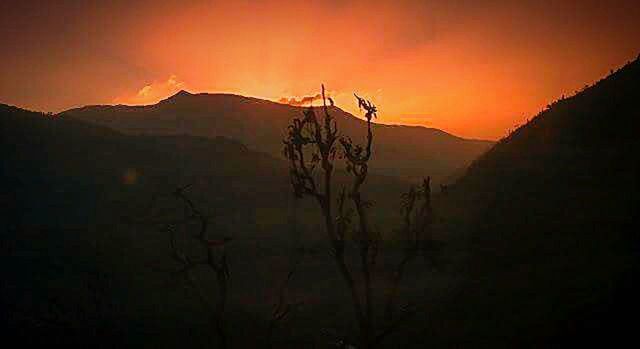 SUNSET OVER MOUNTAINS