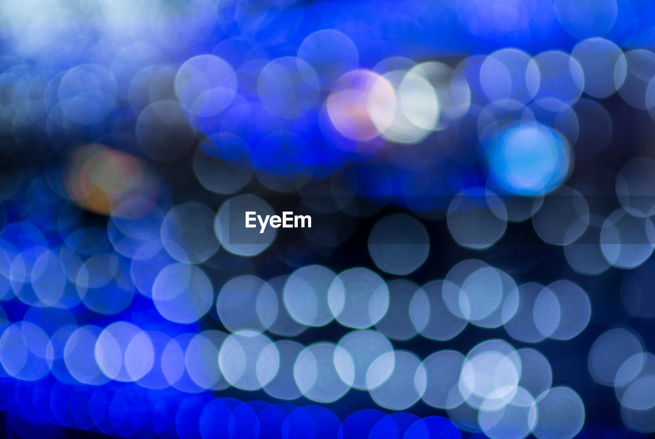 Full frame shot of defocused blue lights