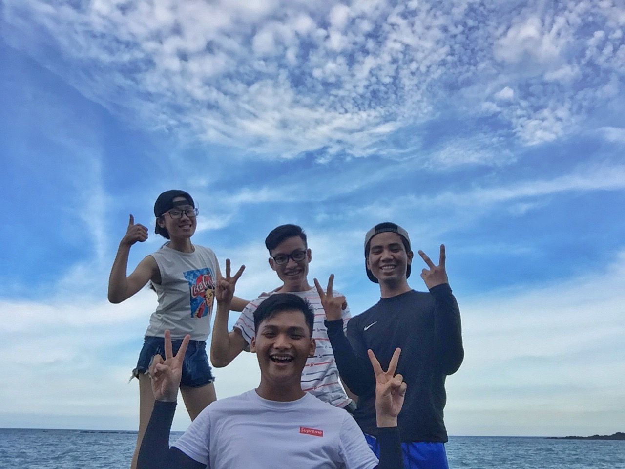 FRIENDS ENJOYING IN WATER