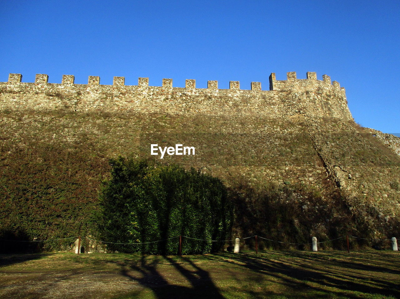 sky, plant, nature, clear sky, tree, blue, hill, no people, land, architecture, landscape, travel destinations, sunny, history, sunlight, day, scenics - nature, environment, travel, the past, outdoors, beauty in nature, grass, field, built structure, tranquility, tourism, ancient, growth