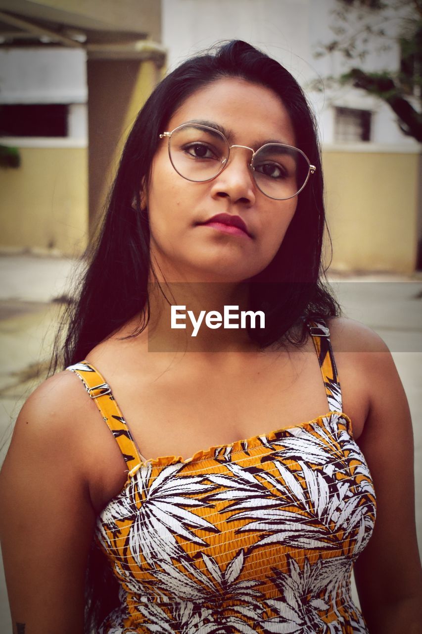 Portrait of a beautiful young woman with raw expression