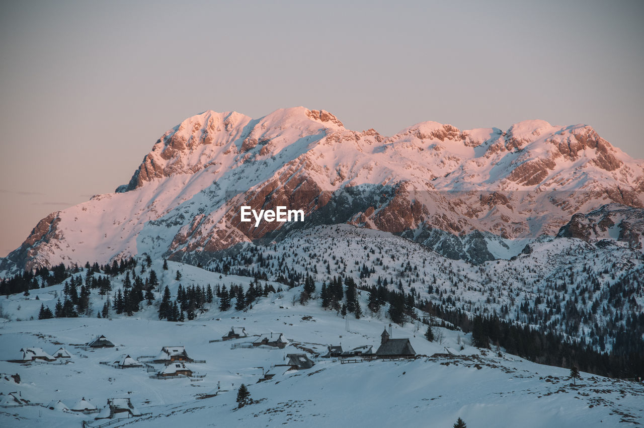 Winter alpine landscape at sunrise