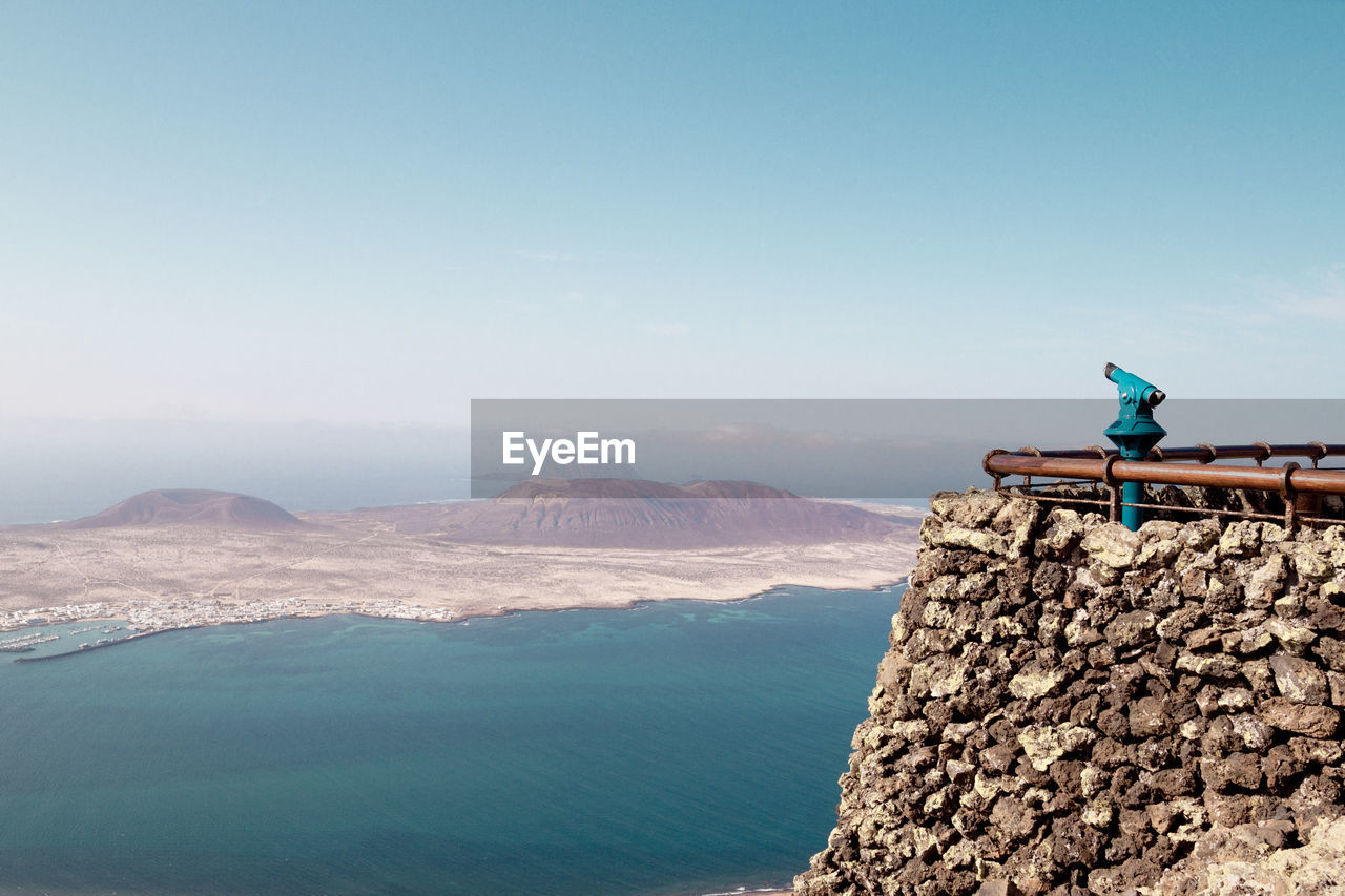 Telescope at mirador del rio against sky