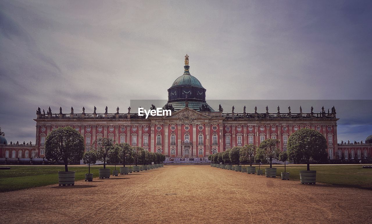 View of building against cloudy sky