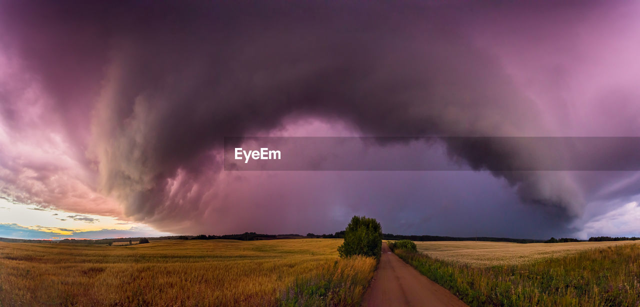 SCENIC VIEW OF DRAMATIC SKY OVER LAND