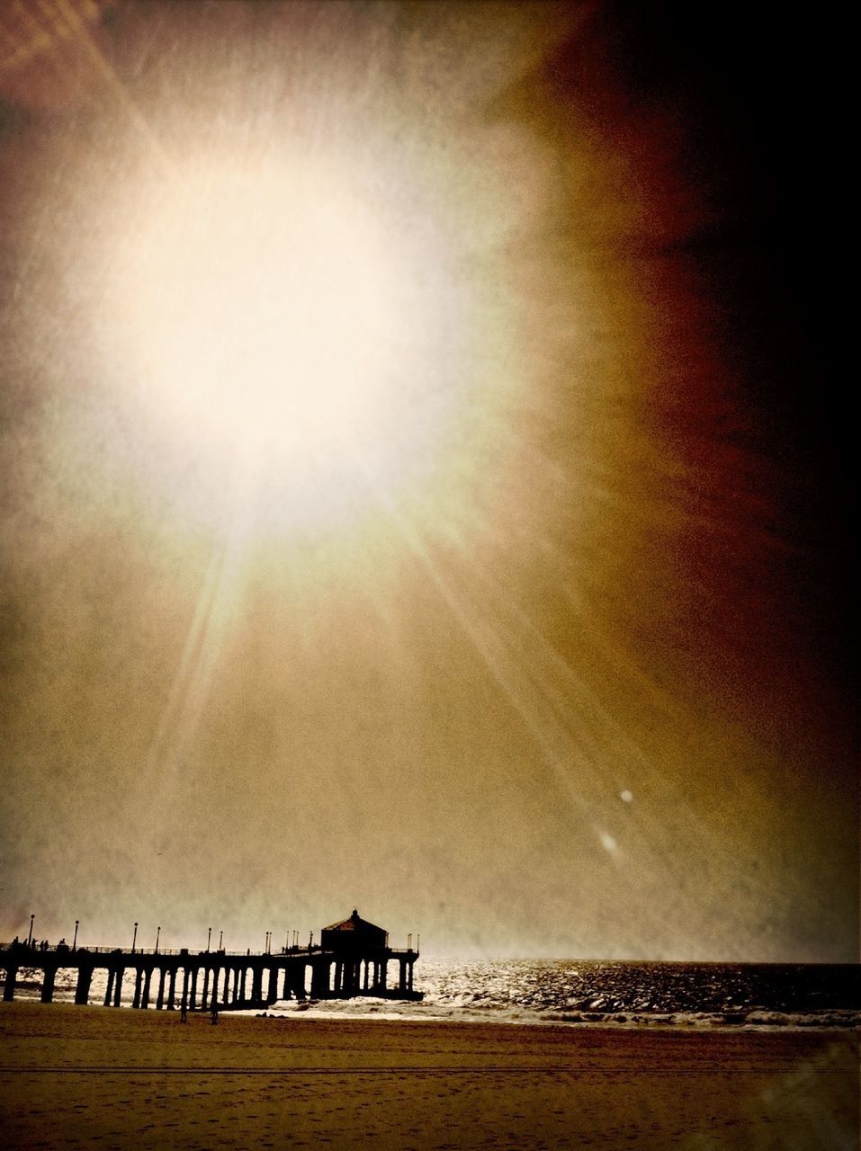 Pier on sea in sunlight