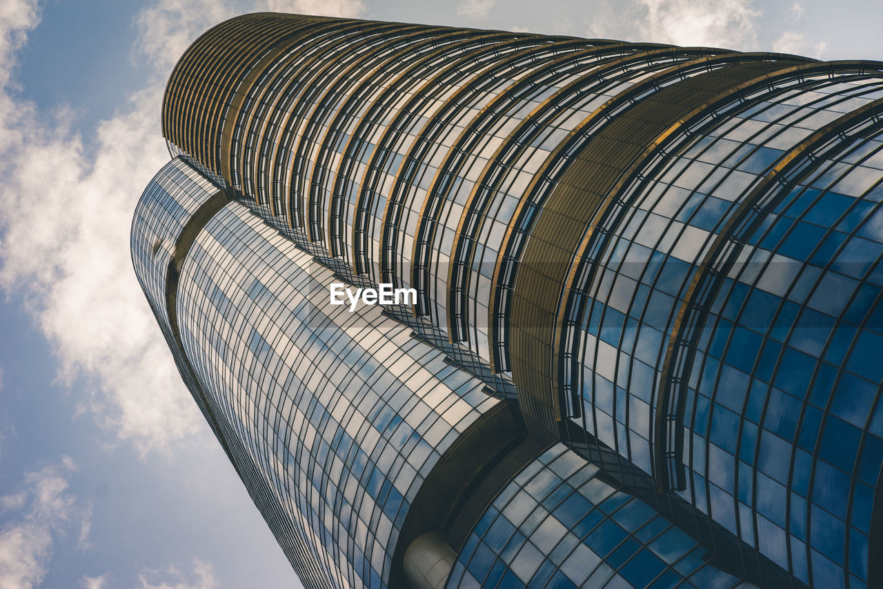 Low angle view of modern building against sky