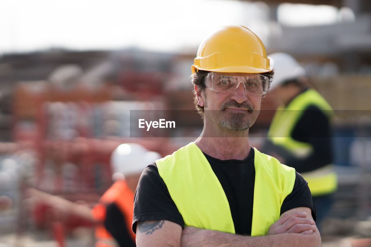 Portrait of confident architect at construction site