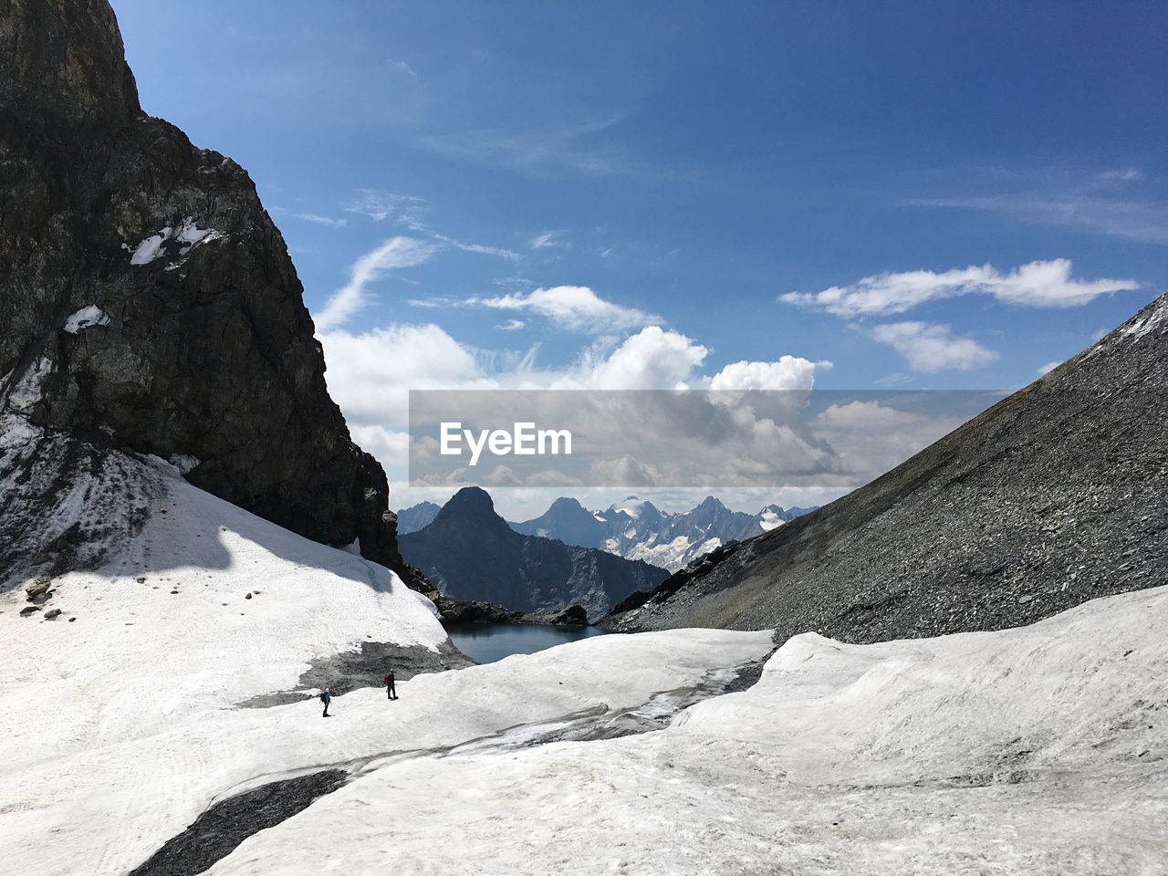 Scenic view of mountains against sky during winter