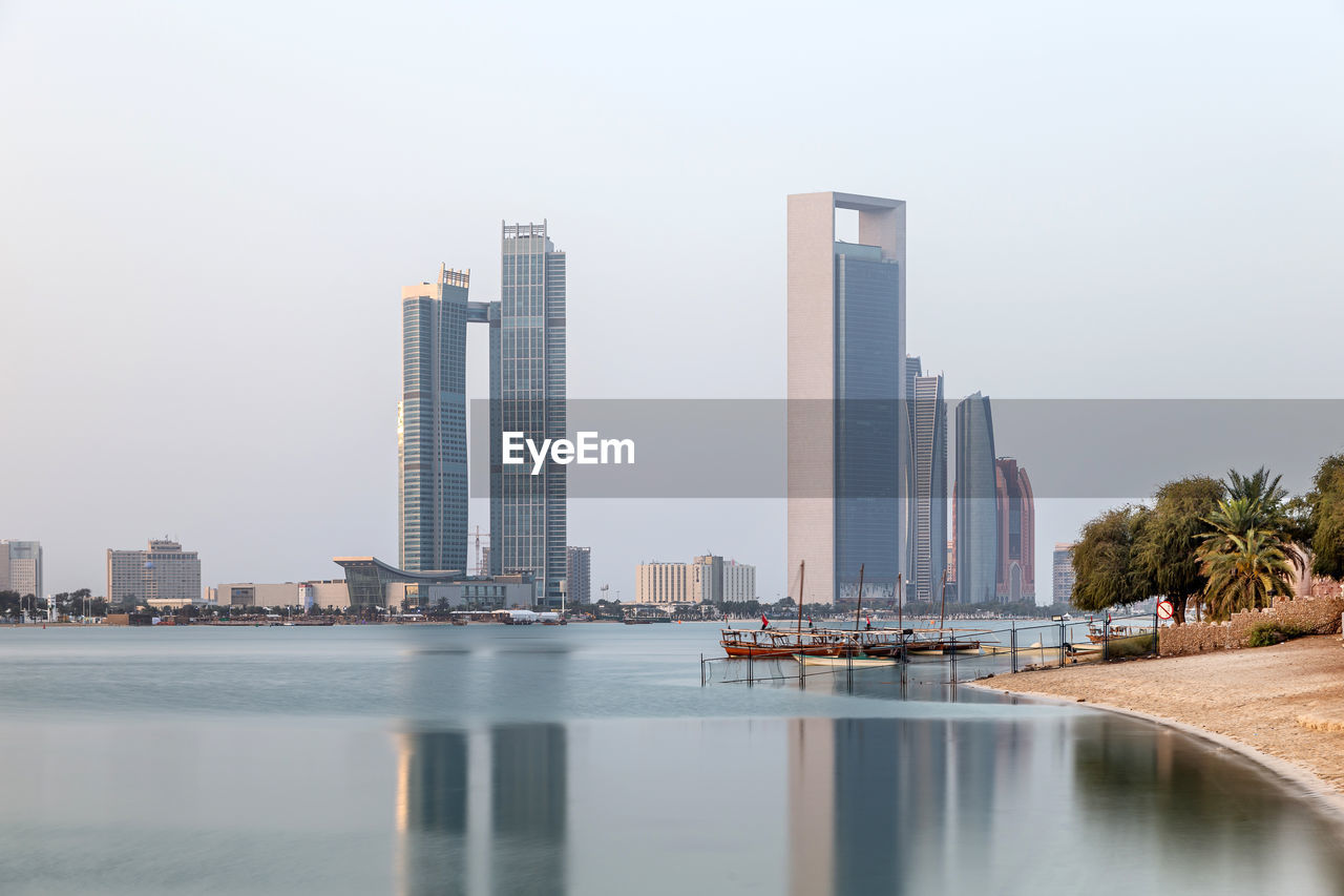 Abu dhabi skyline early morning. establishing shot.