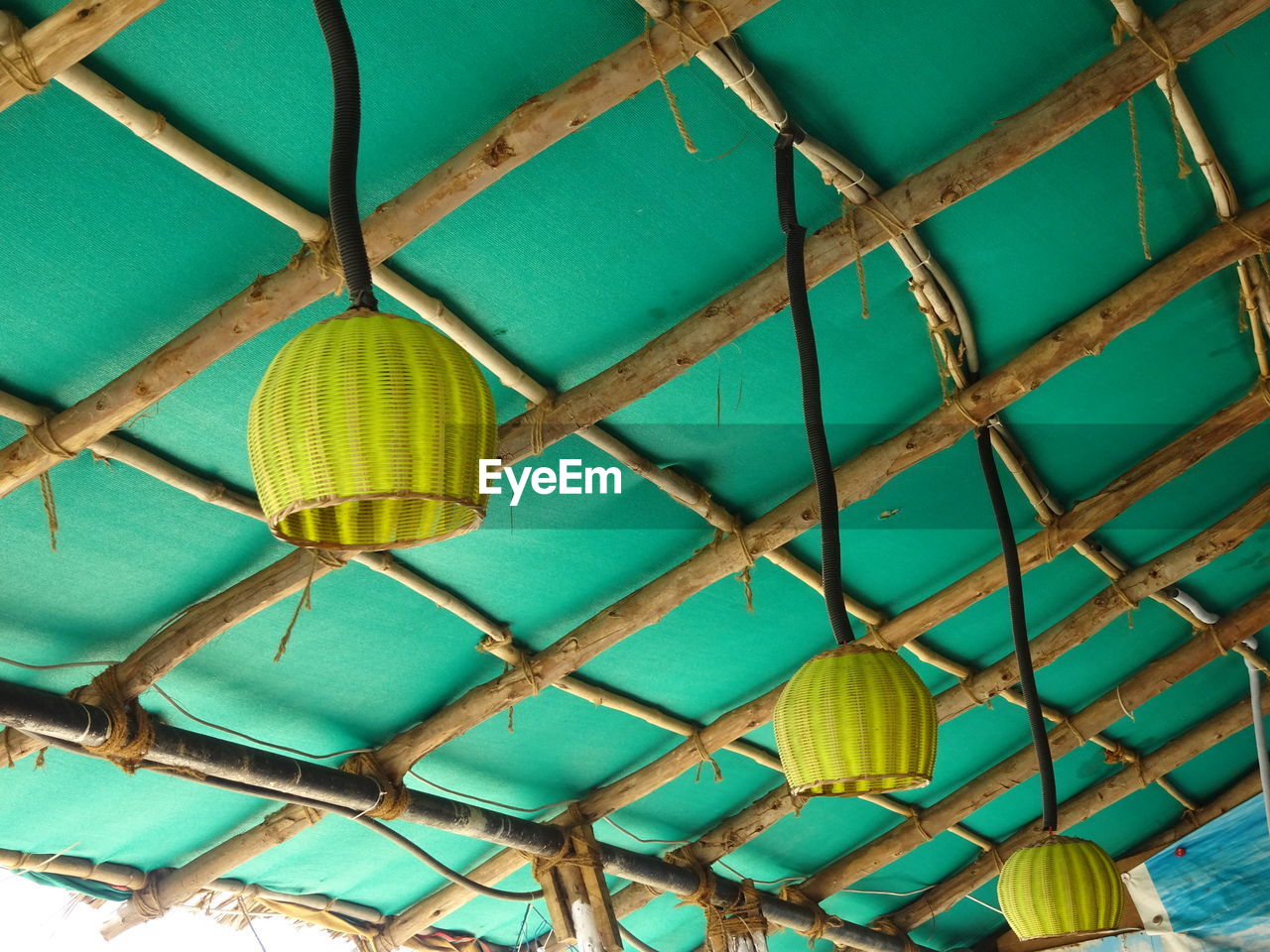 Low angle view of lantern hanging on ceiling