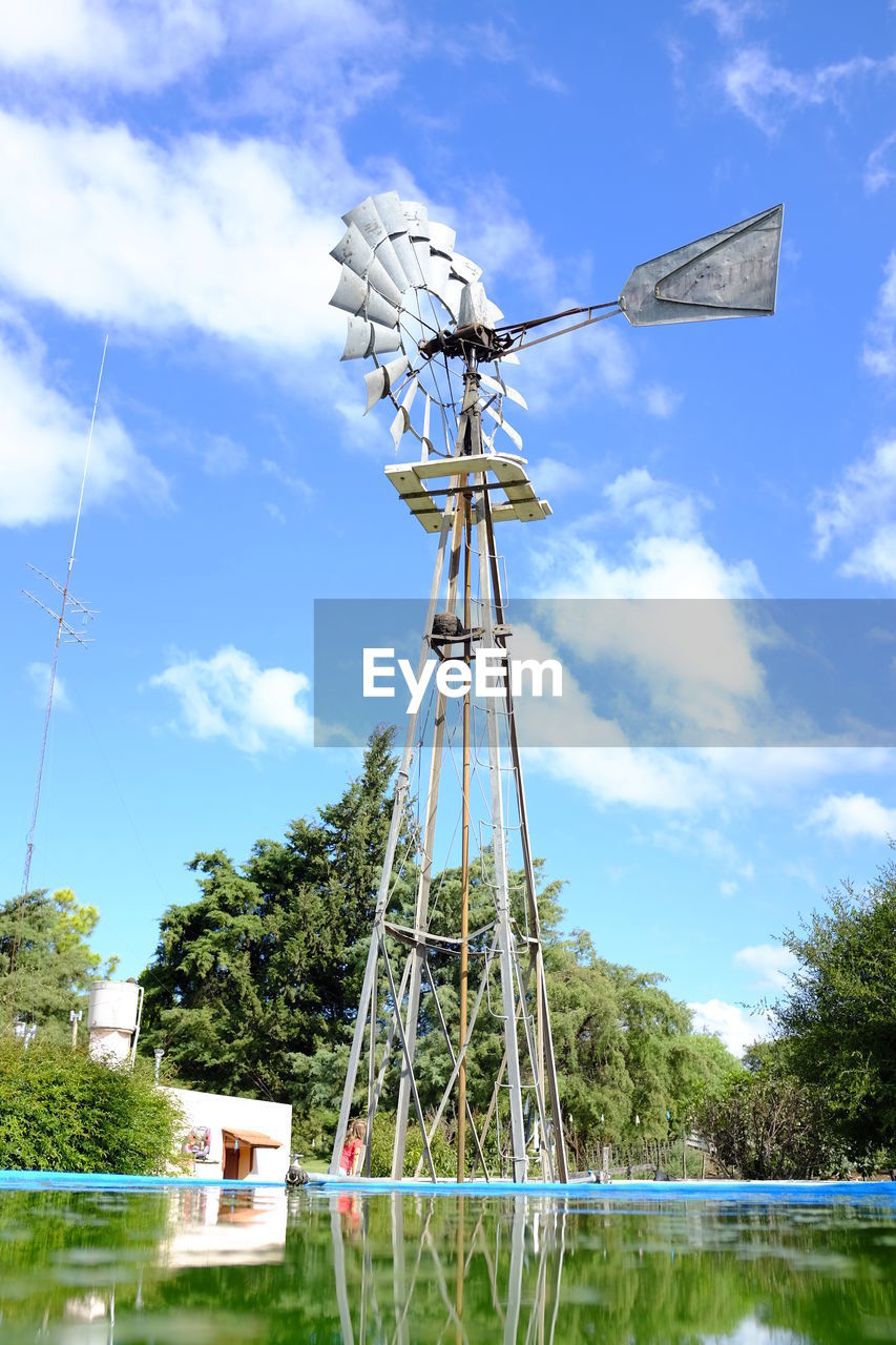 LOW ANGLE VIEW OF WINDMILL AGAINST SKY