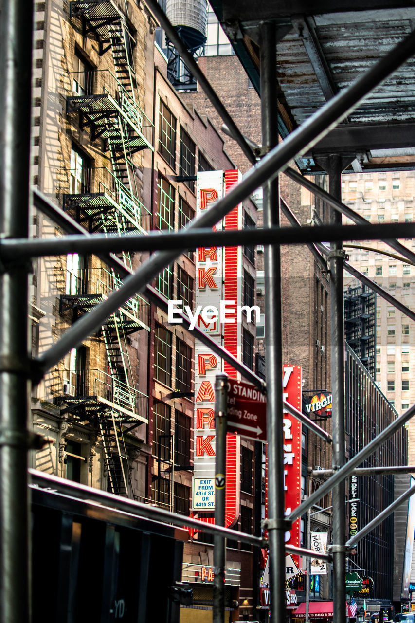 VIEW OF RAILING BY BUILDINGS