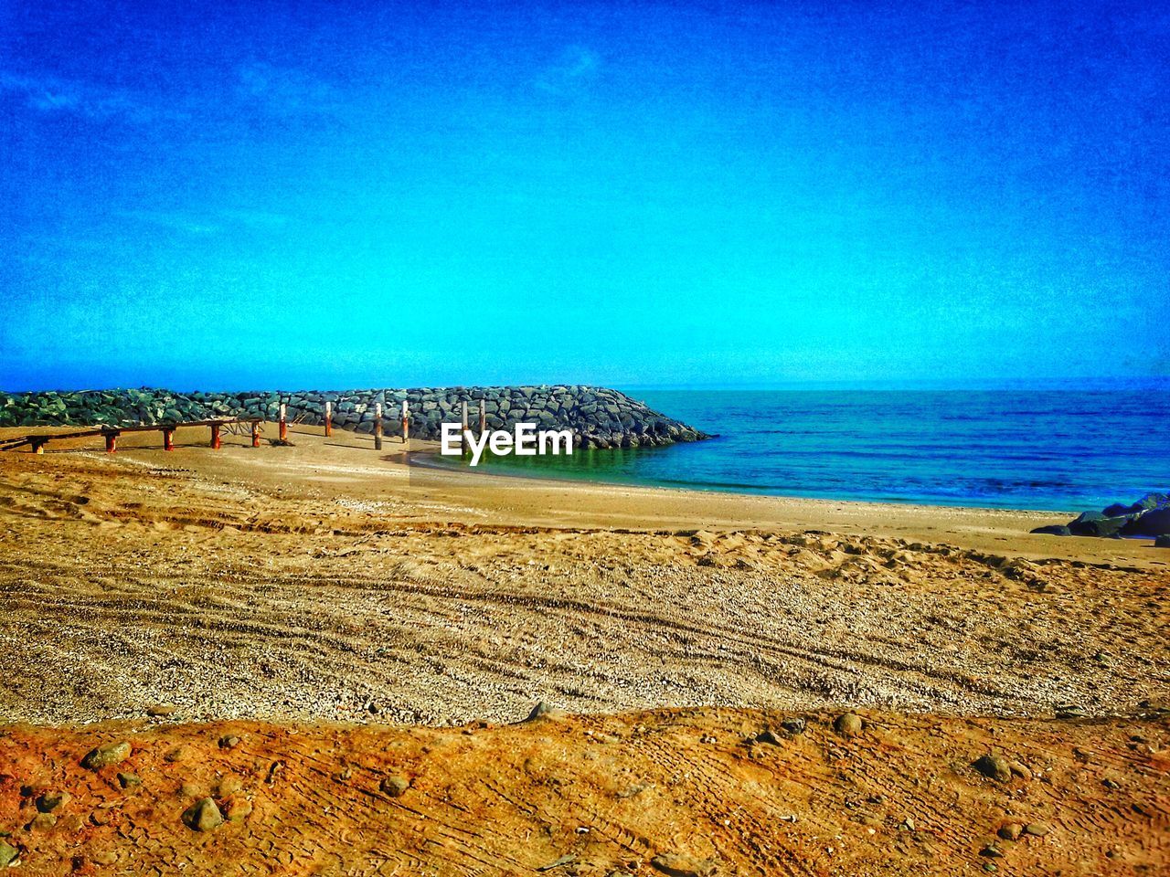 BEACH AGAINST BLUE SKY