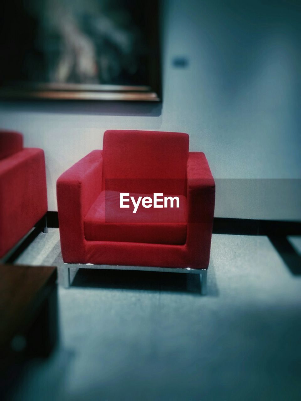 Red armchair in house