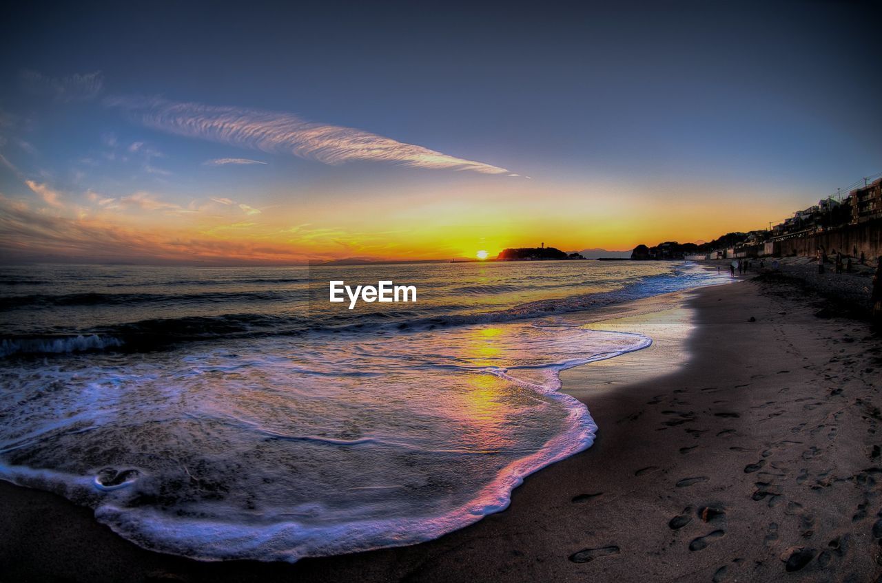 VIEW OF SEA AT SUNSET