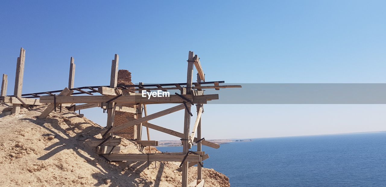 LIFEGUARD HUT AGAINST CLEAR SKY