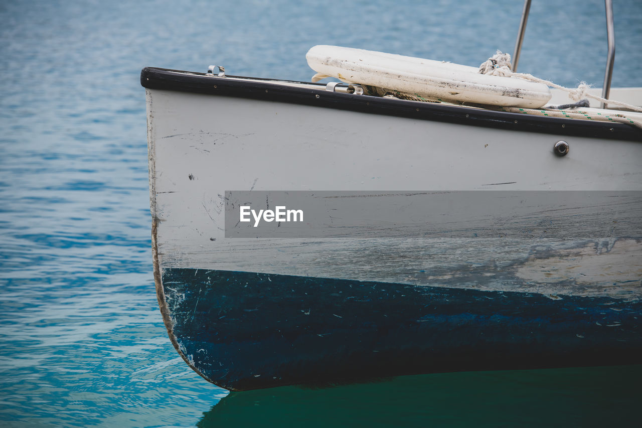 water, nautical vessel, vehicle, transportation, sea, blue, mode of transportation, boat, ship, nature, reflection, no people, watercraft, ocean, day, sailboat, outdoors, moored, sailing, travel