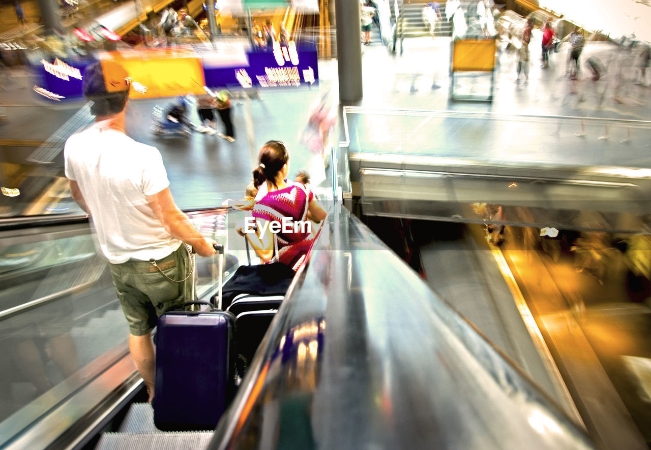 Blurred motion of people in train