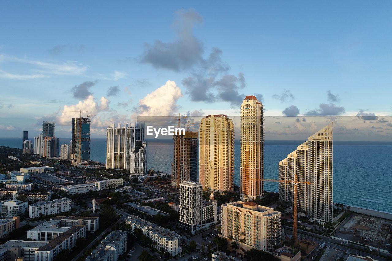 Panoramic view of modern buildings against sky