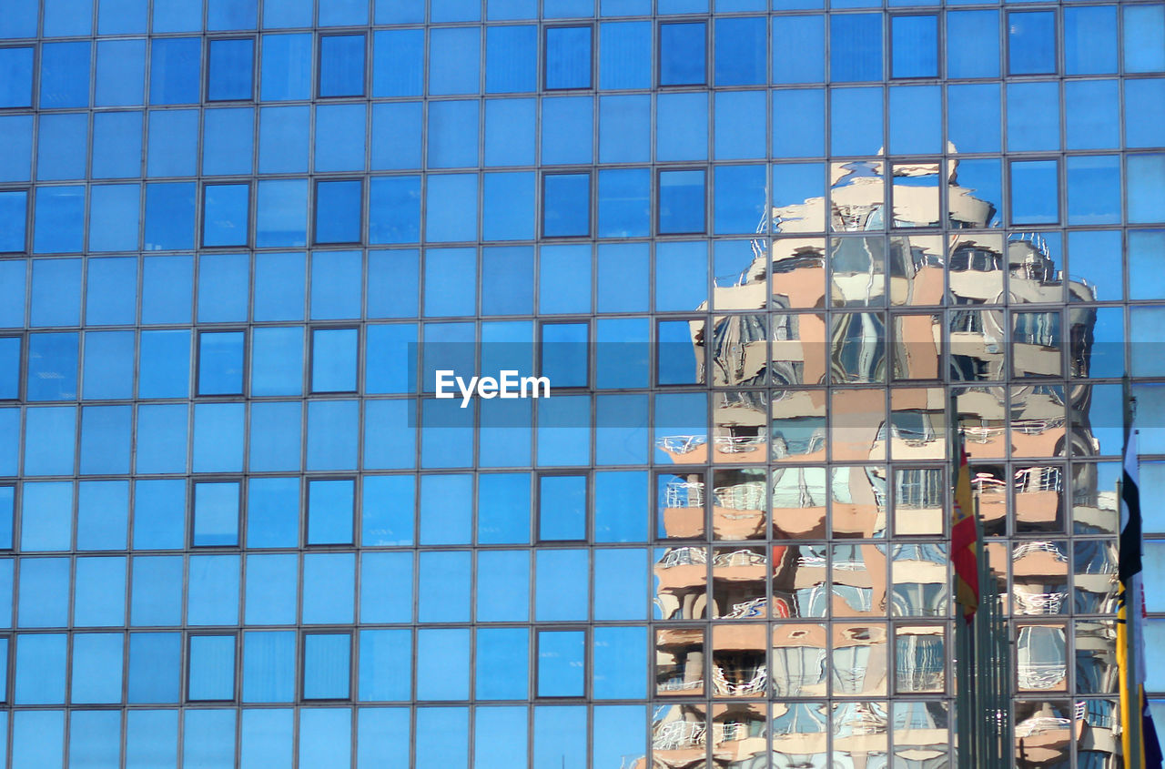 Building exterior, reflection in the glass