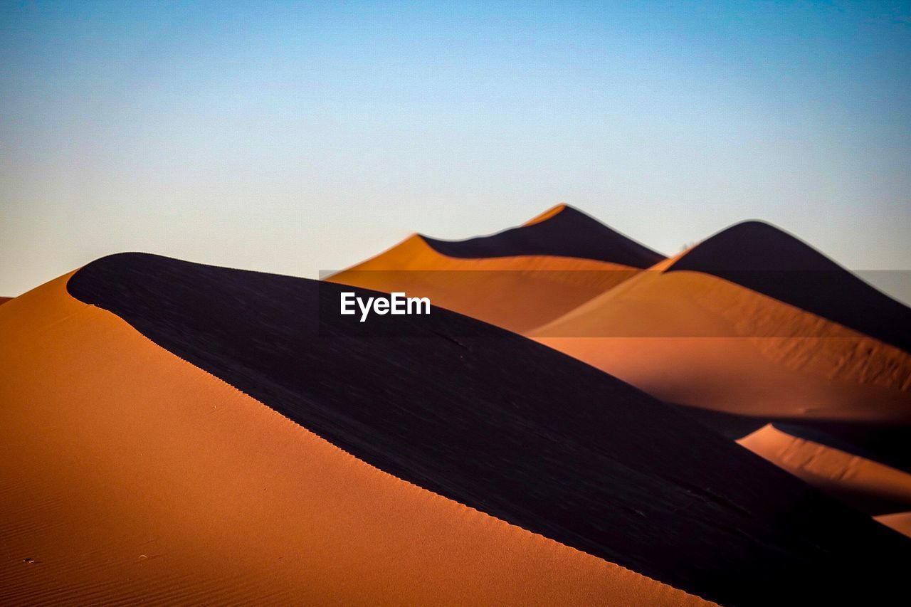 Low angle view of mountain against clear sky