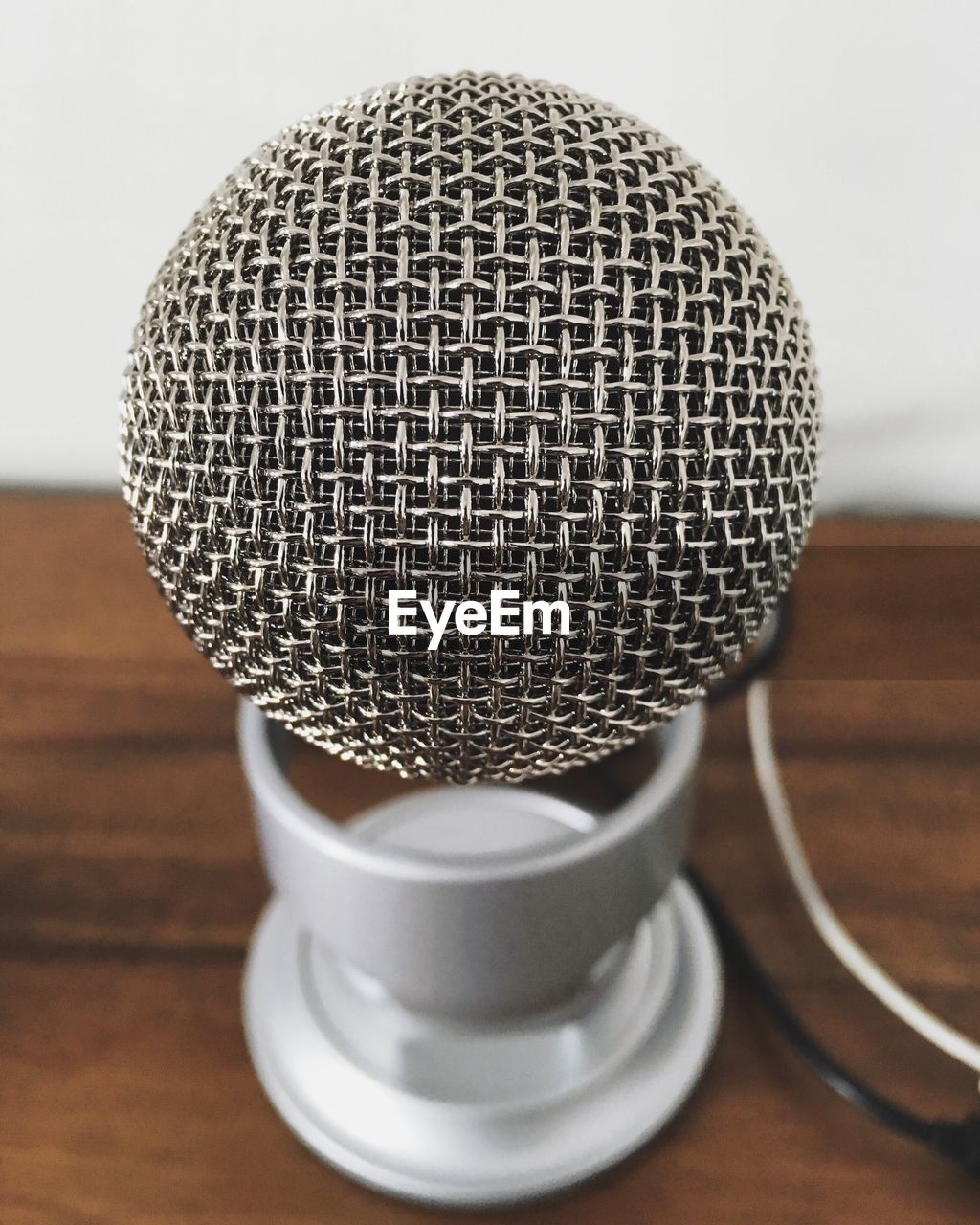 Close-up of microphone on table