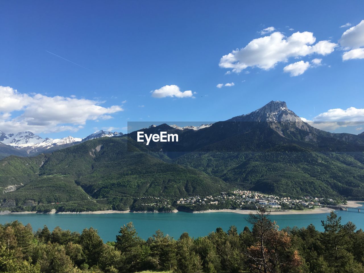 SCENIC VIEW OF MOUNTAINS AND LAKE