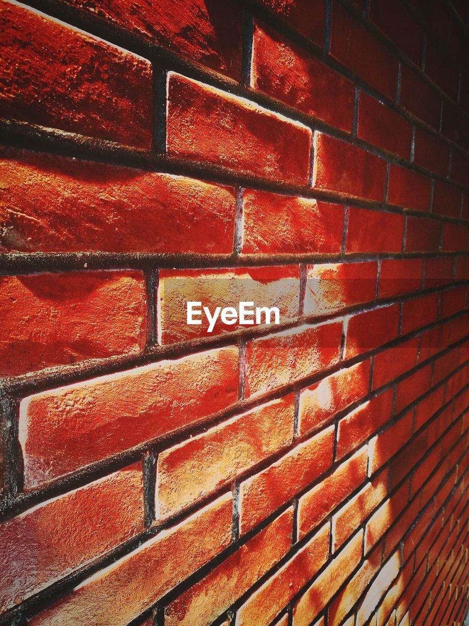 FULL FRAME SHOT OF RED BRICK WALL