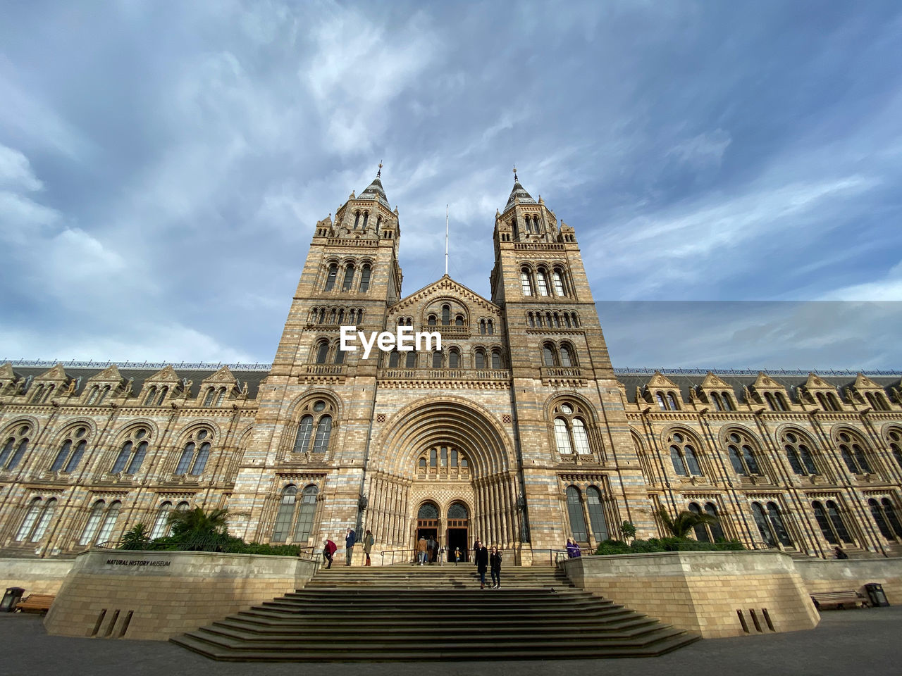 Low angle view of natural history museum building against sky