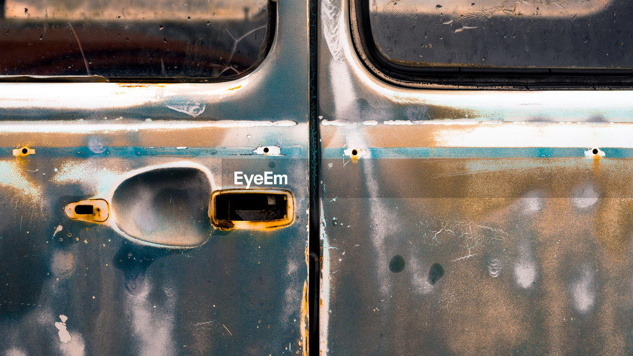 Close-up of abandoned vehicle