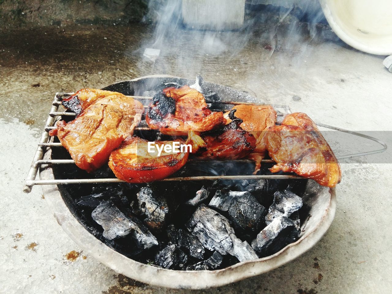 CLOSE-UP OF SEAFOOD ON BARBECUE GRILL