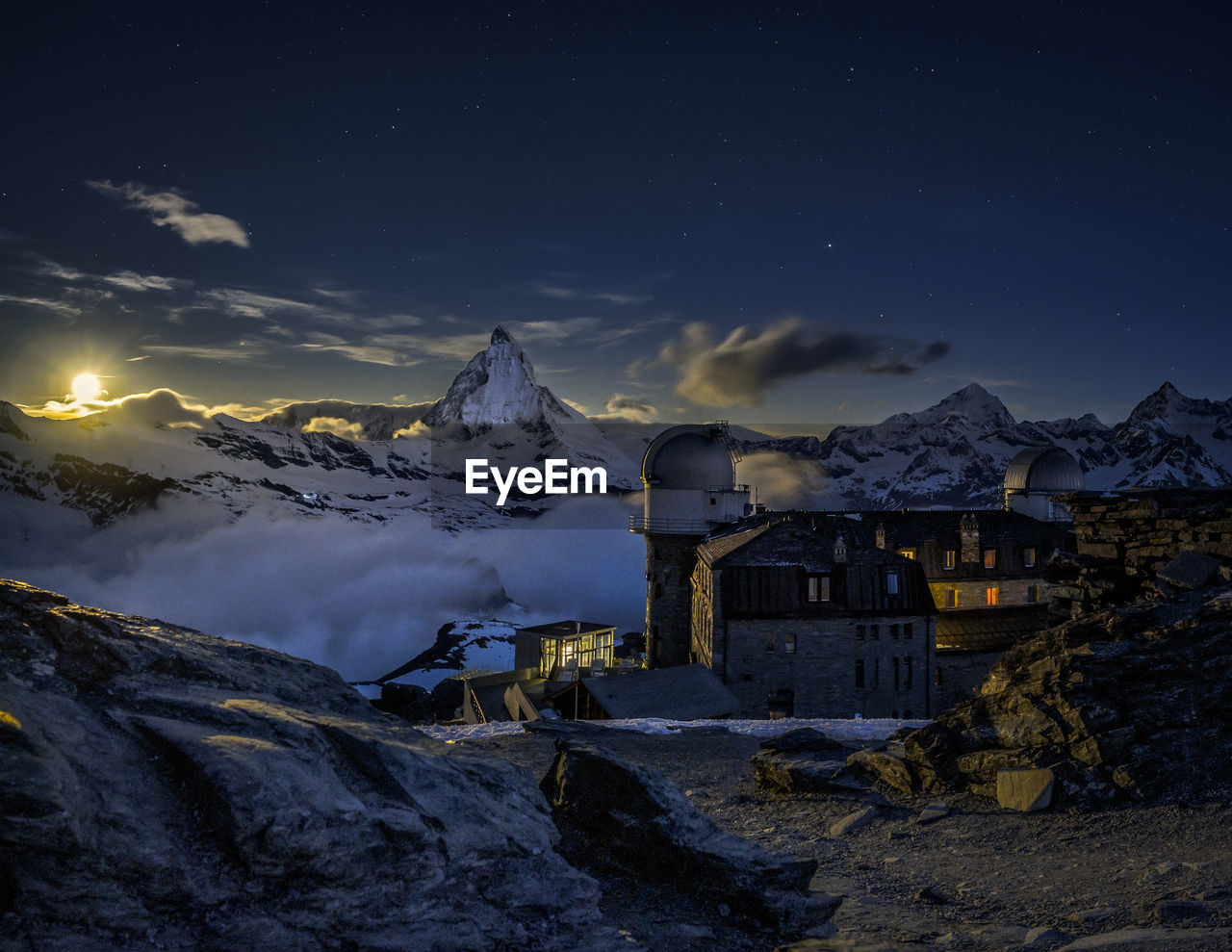 HOUSES AGAINST SKY DURING WINTER