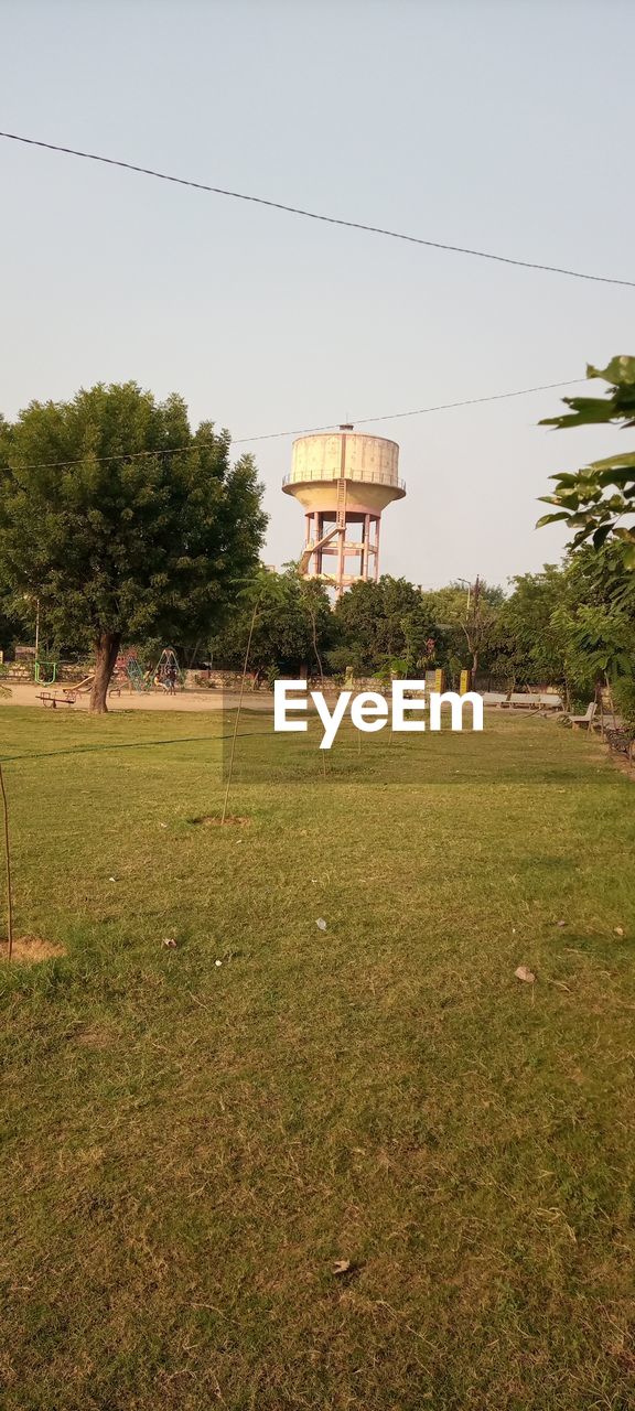 Built structure on field against clear sky