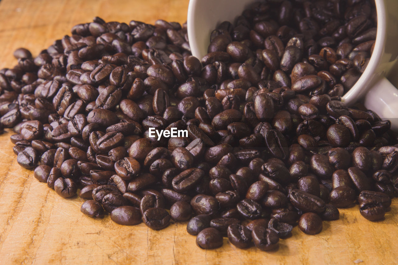 CLOSE-UP OF COFFEE BEANS IN GLASS