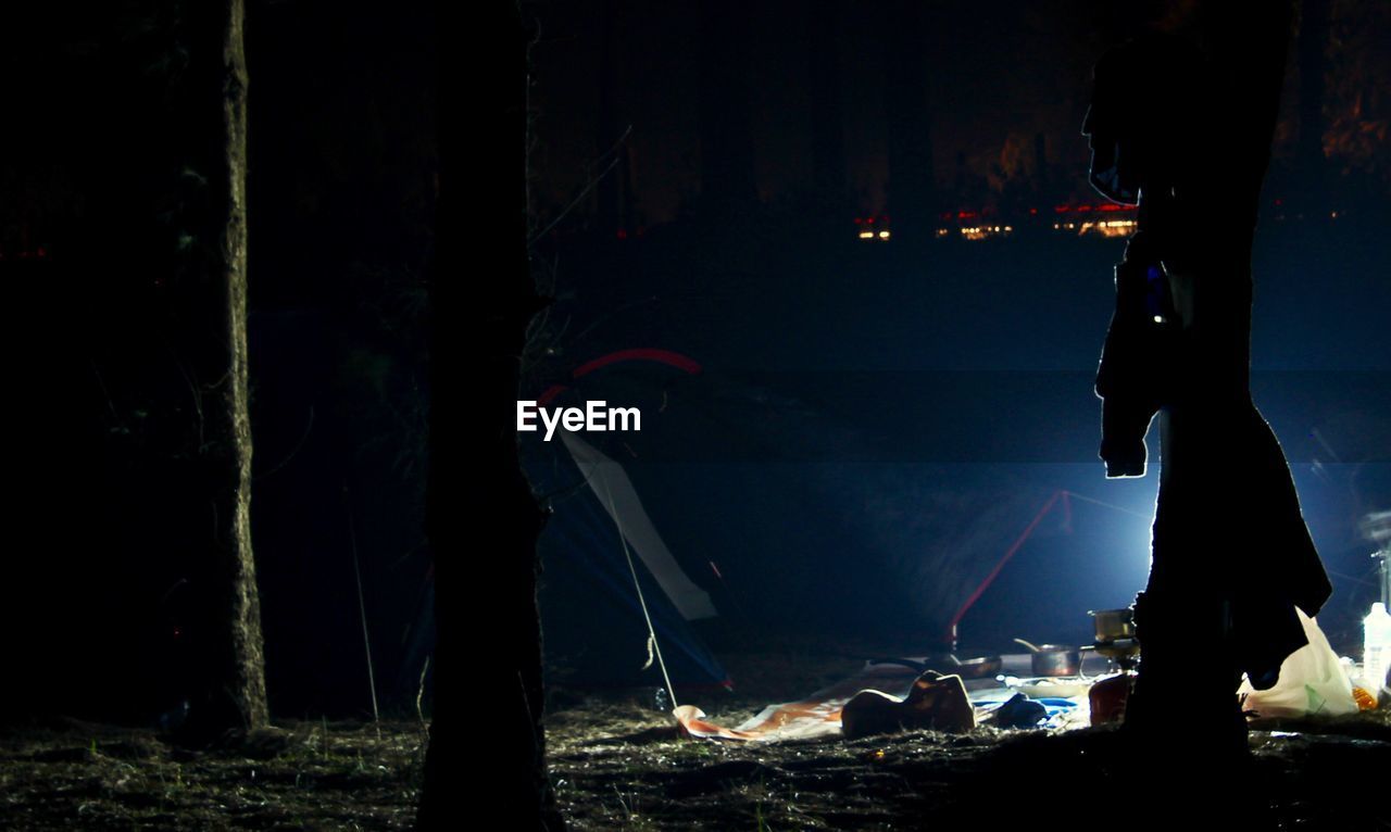 Tents in forest at night