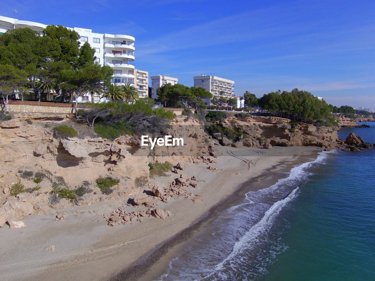 VIEW OF BEACH AGAINST CLEAR SKY