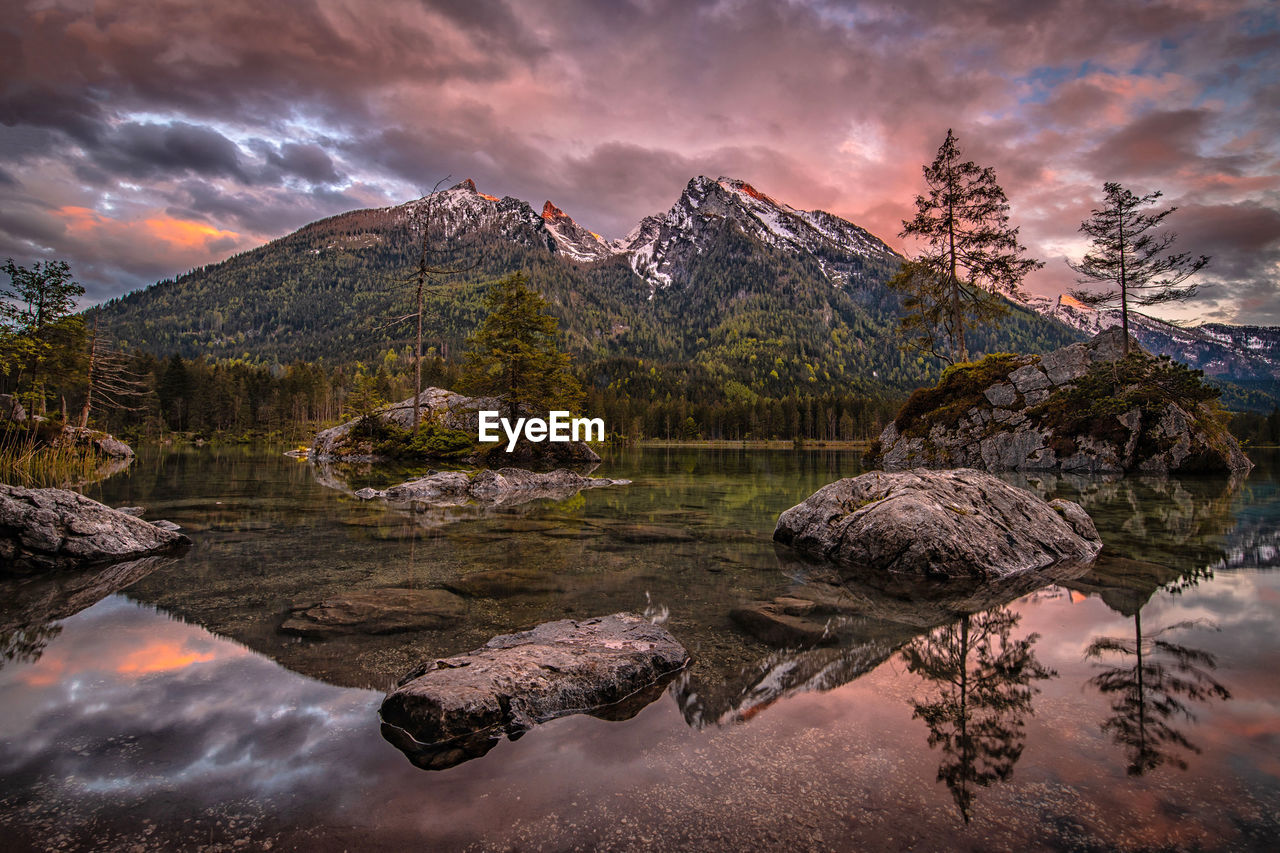 Scenic view of lake against sky during sunset