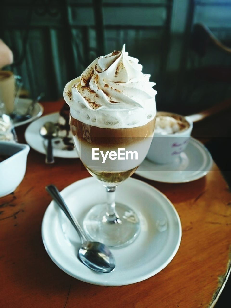 Cappuccino served on table in restaurant