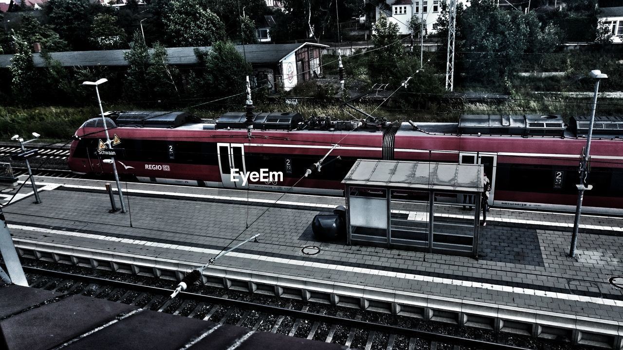 TRAIN AT RAILROAD TRACKS