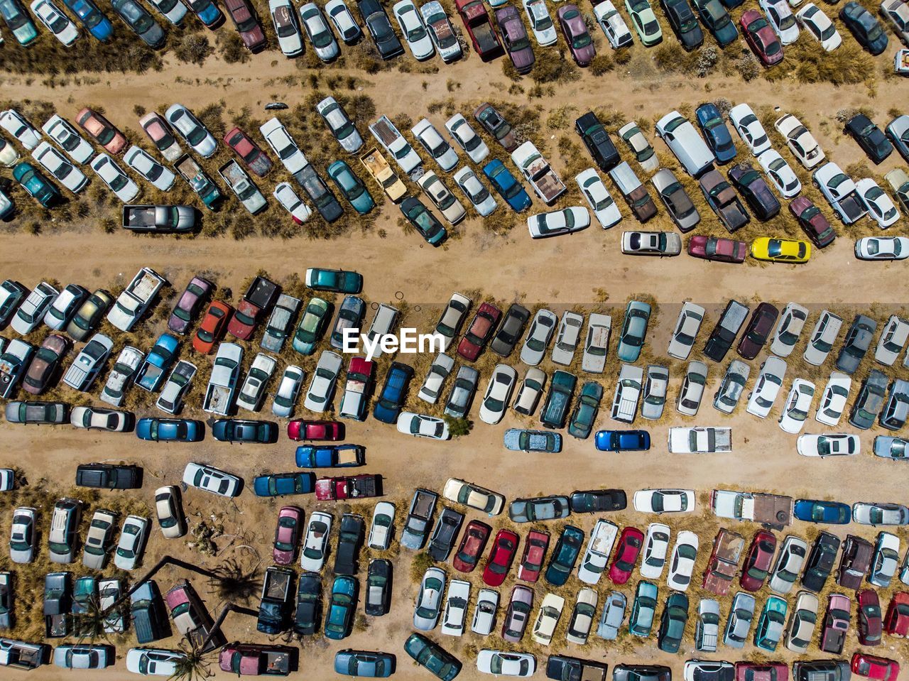 HIGH ANGLE VIEW OF VARIOUS CHAIRS IN ROW