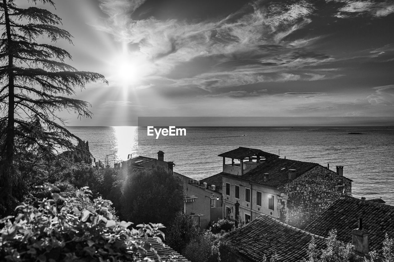 Sunset at sea in rovinj bay, istria, croatia