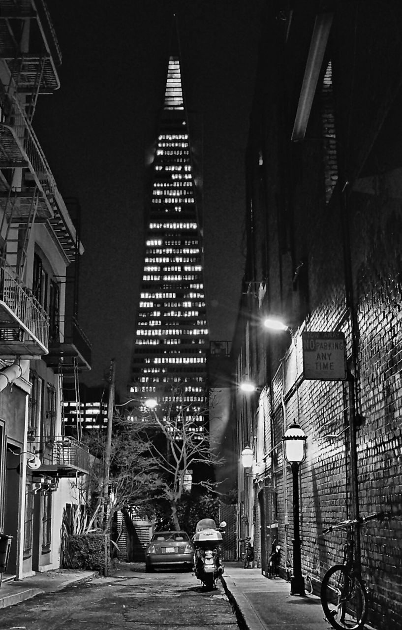 Low angle view of illuminated buildings at night