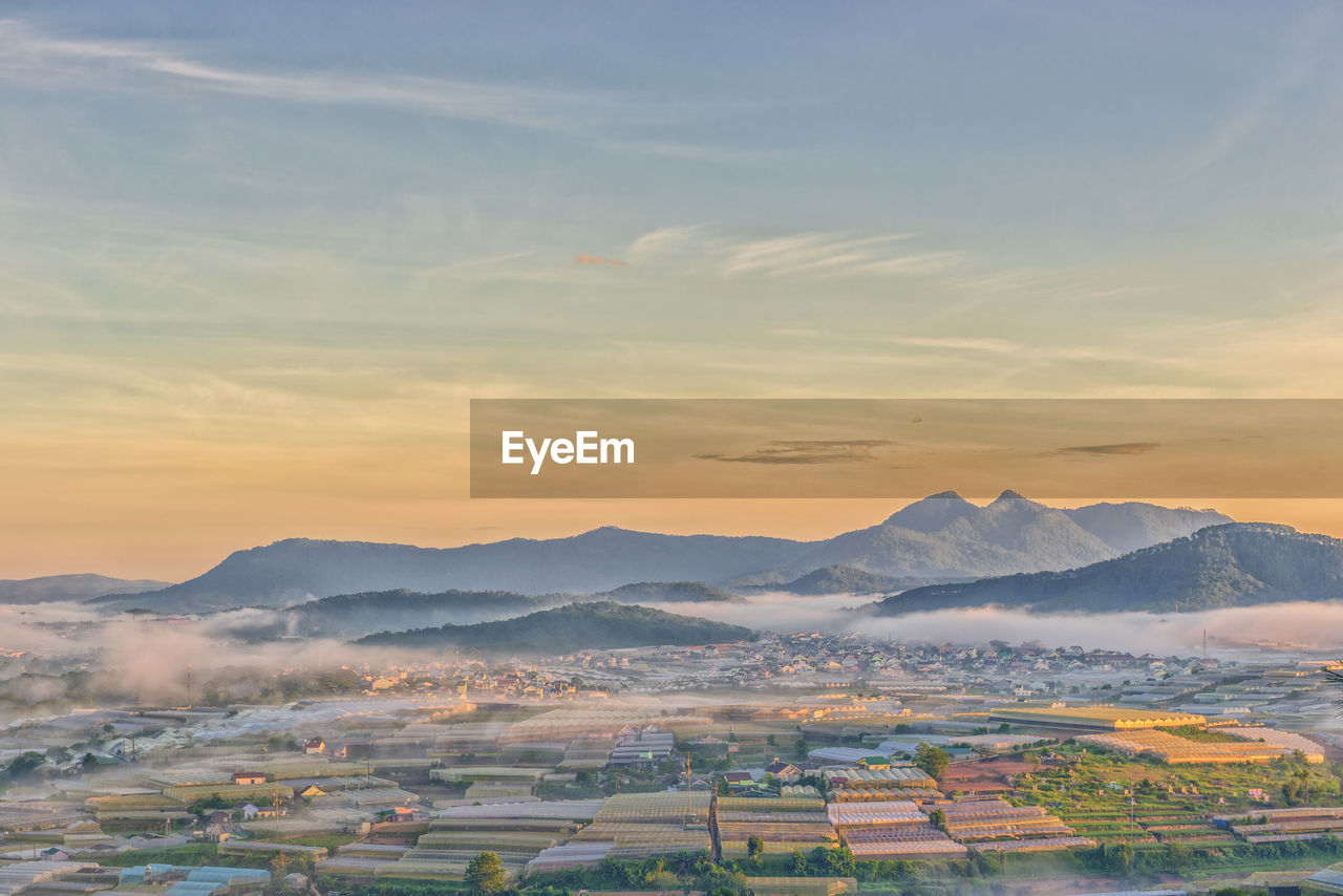 Scenic view of landscape against sky during sunset