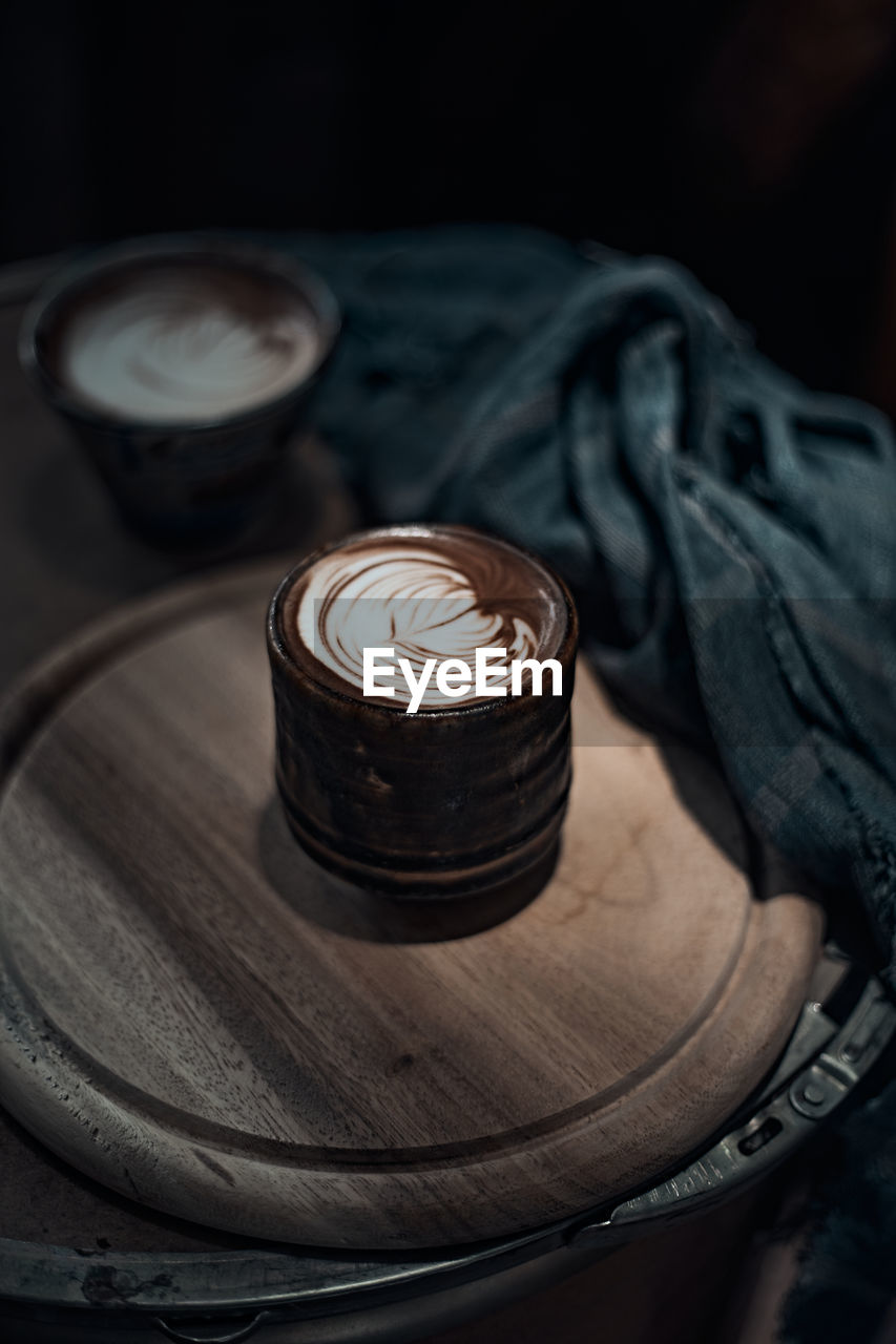 CLOSE-UP OF COFFEE ON TABLE