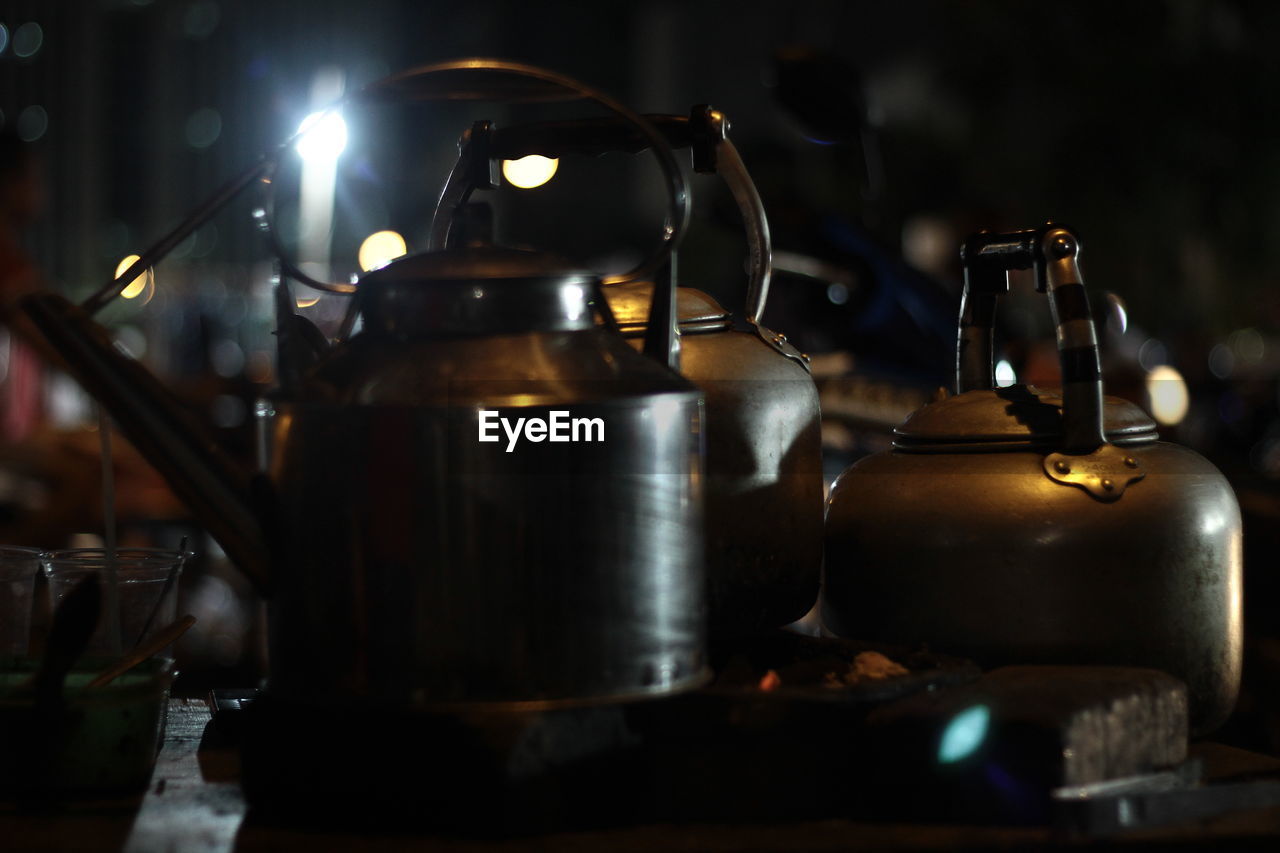Close-up of tea kettle on stove outdoors